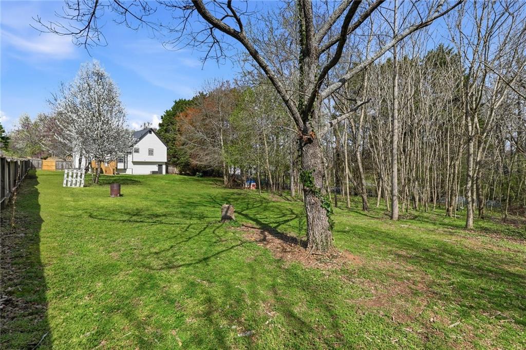 8020 Estee Drive Cumming, GA 30028 - Photo 32 of 41 a view of a park with large trees