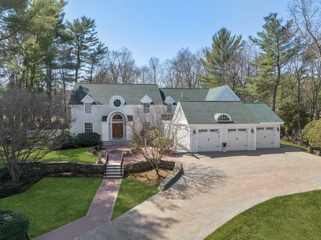 30 Hillcrest Road Weston, MA 02493 - Photo 1 of 29 a front view of a house with garden