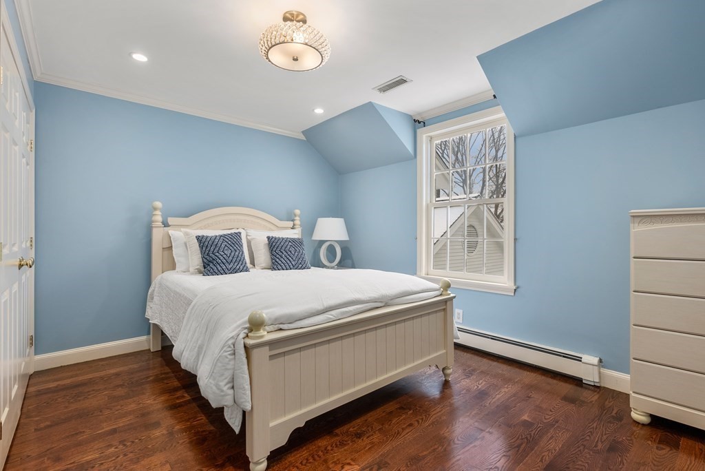 30 Hillcrest Road Weston, MA 02493 - Photo 19 of 29 a bedroom with a bed and a window