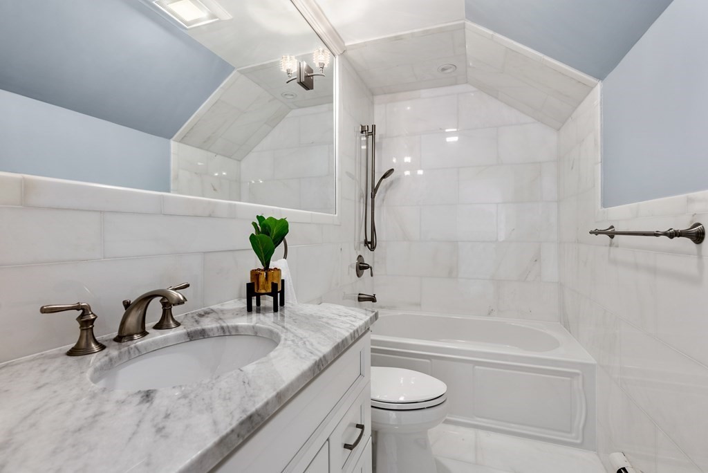 30 Hillcrest Road Weston, MA 02493 - Photo 20 of 29 a bathroom with a granite countertop sink a toilet and shower
