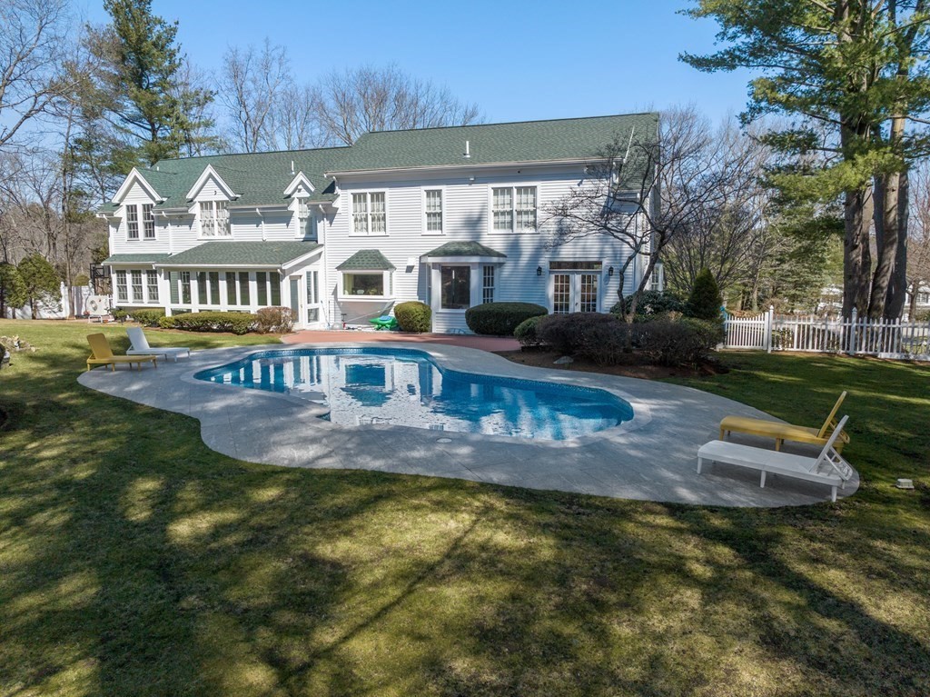 30 Hillcrest Road Weston, MA 02493 - Photo 27 of 29 a view of a house with swimming pool yard and porch