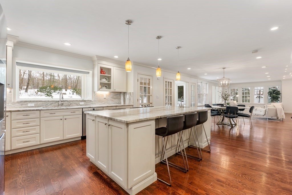 30 Hillcrest Road Weston, MA 02493 - Photo 5 of 29 a open kitchen with lots of counter space dining table and chairs