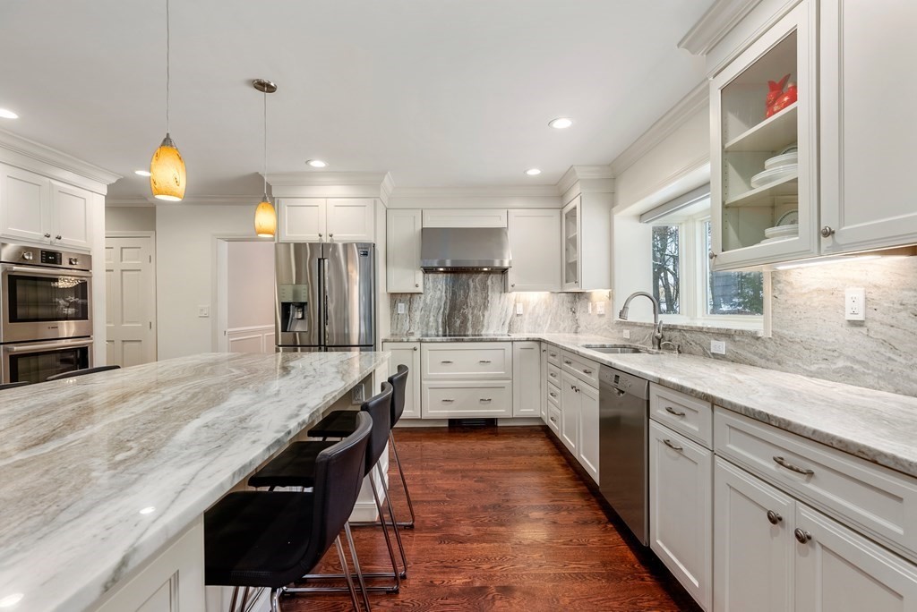 30 Hillcrest Road Weston, MA 02493 - Photo 6 of 29 a large kitchen with granite countertop lots of counter space and window