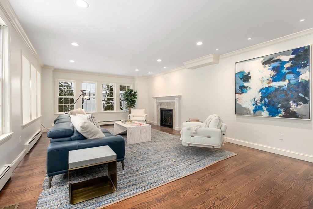 30 Hillcrest Road Weston, MA 02493 - Photo 9 of 29 a living room with furniture and a fireplace