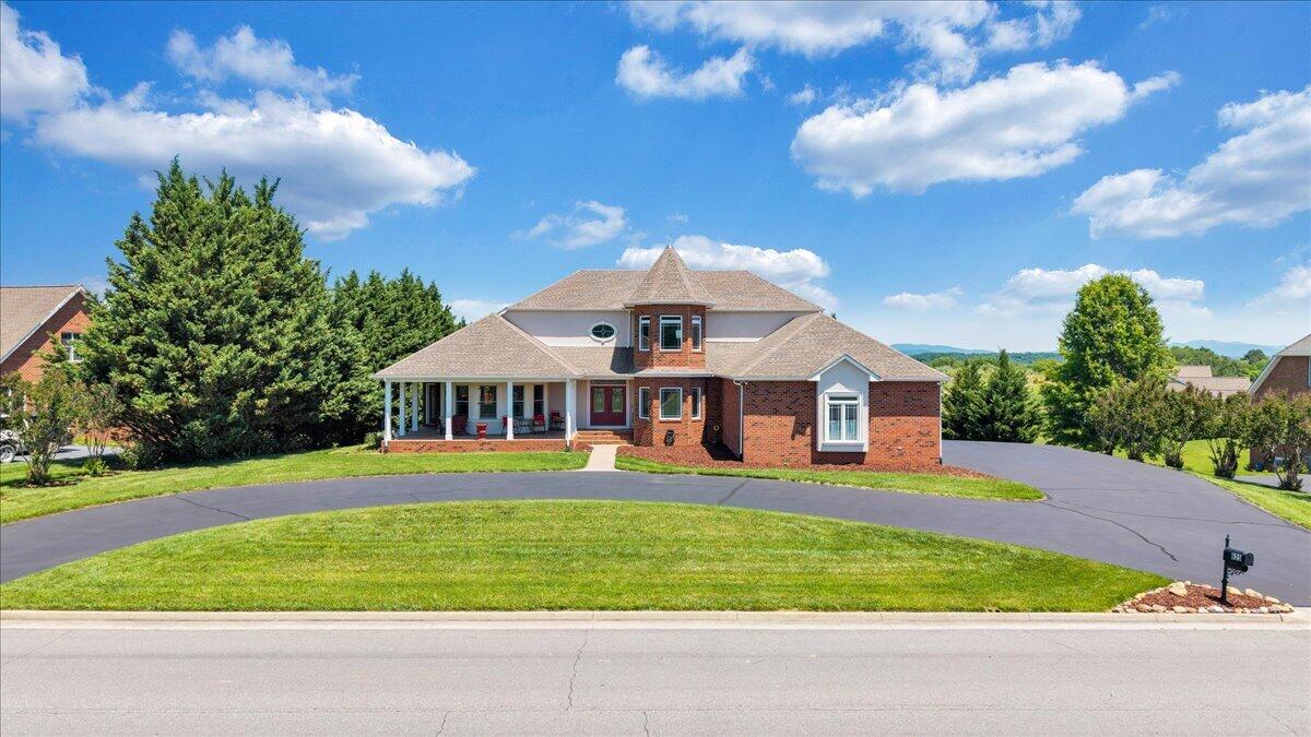 625 Frontier Way Fincastle, VA 24090 - Photo 98 of 105 a view of a big house with a big yard and large trees