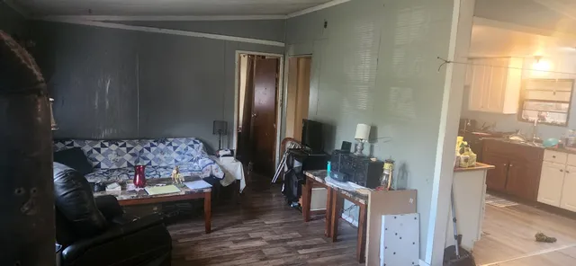 a kitchen with a refrigerator stove and sink