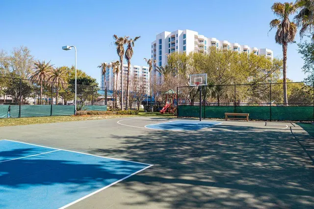 a very nice looking room with a dining table a chandelier