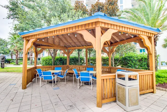a view of a hall with wooden floor