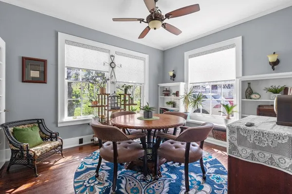 a view of a dining room with furniture window and outside view