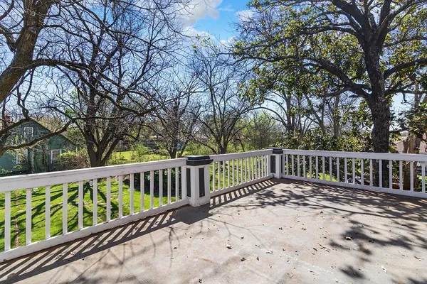 a view of a wooden roof deck