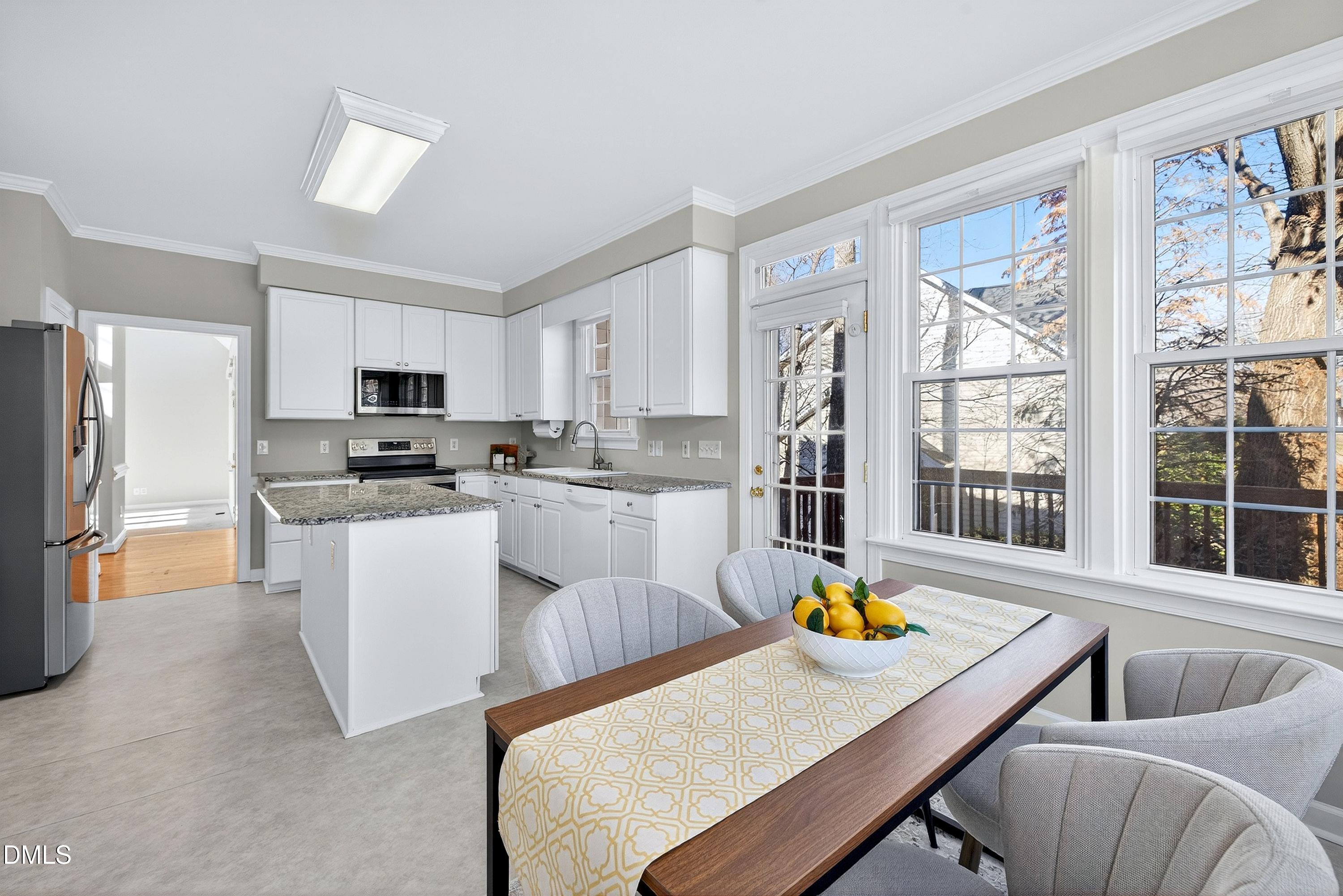 4113 Winding Oak Way Apex, NC 27539 - Photo 34 of 35 Breakfast Room & Kitchen