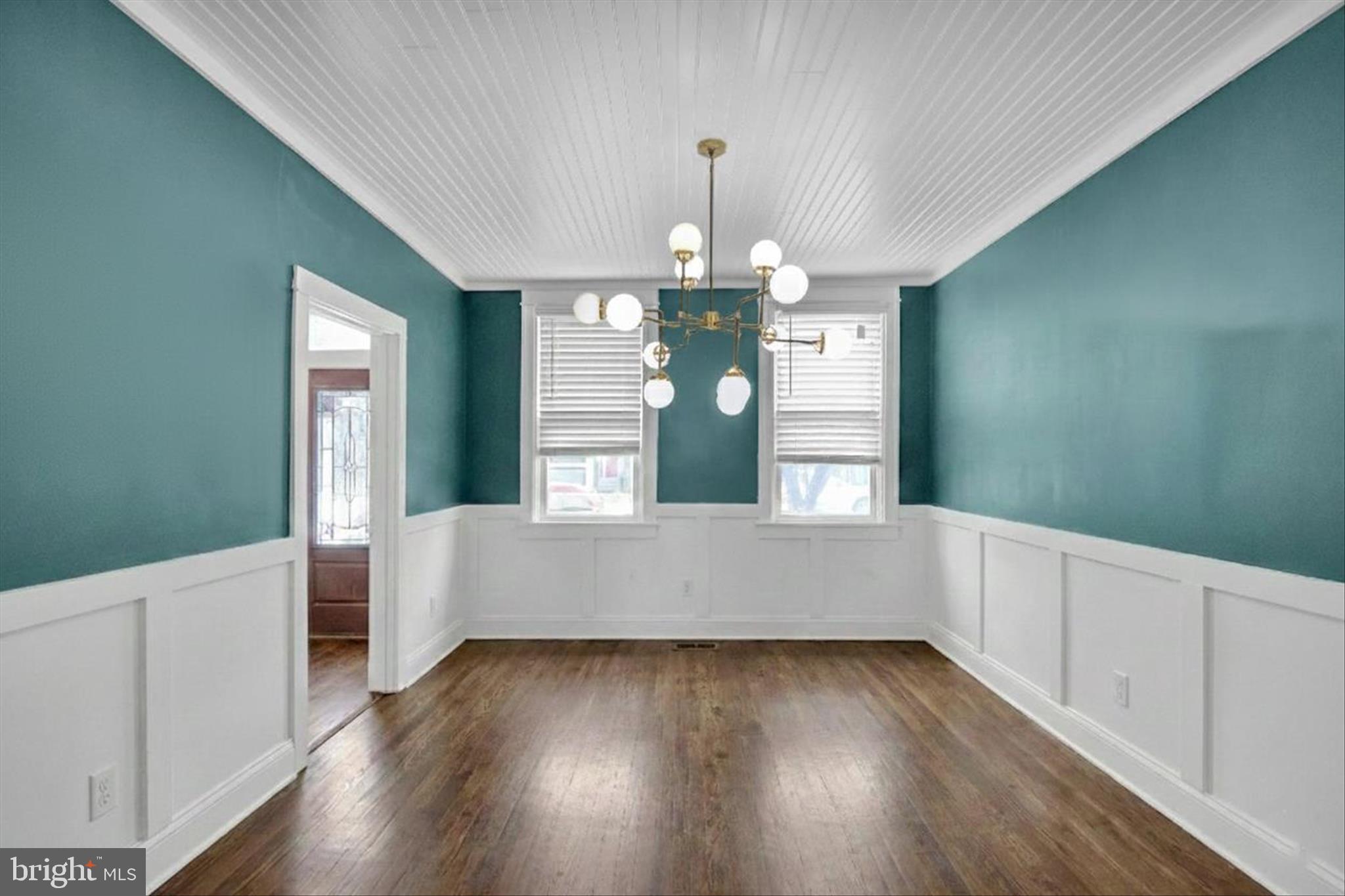 431 East Orange Street Lancaster, PA 17602 - Photo 12 of 46 a large white kitchen with wooden floors