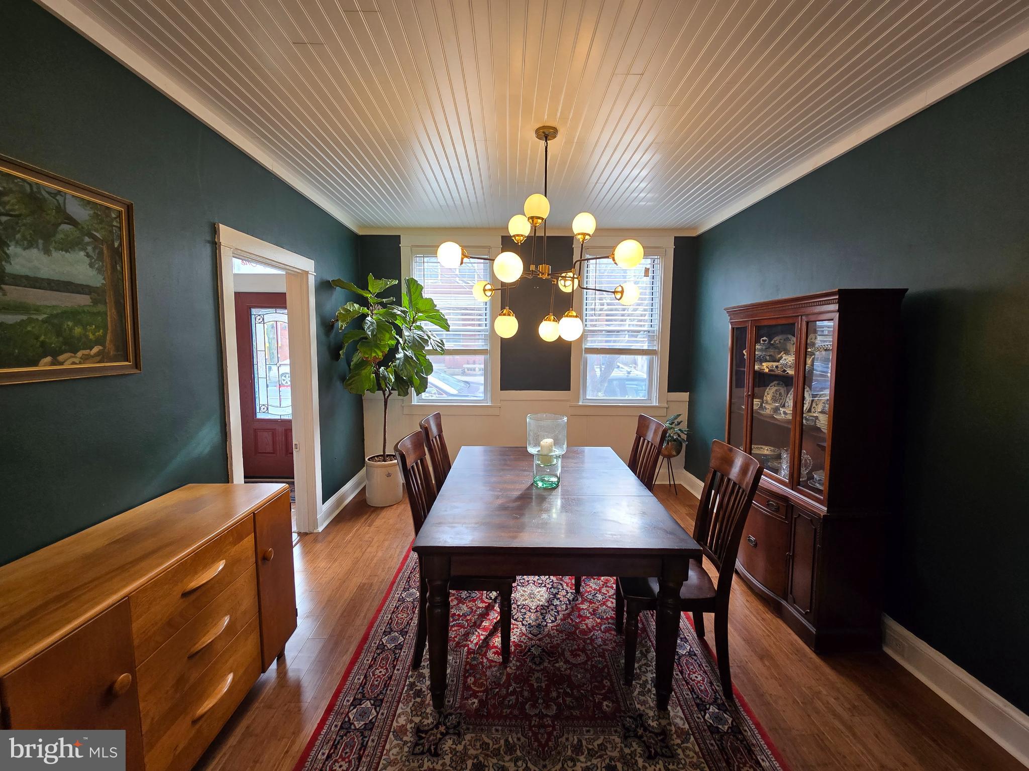431 East Orange Street Lancaster, PA 17602 - Photo 13 of 46 a view of a dining room with furniture and chandelier