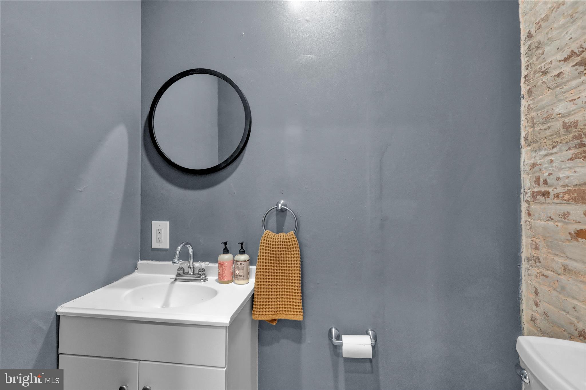 431 East Orange Street Lancaster, PA 17602 - Photo 20 of 46 a bathroom with a sink and a mirror