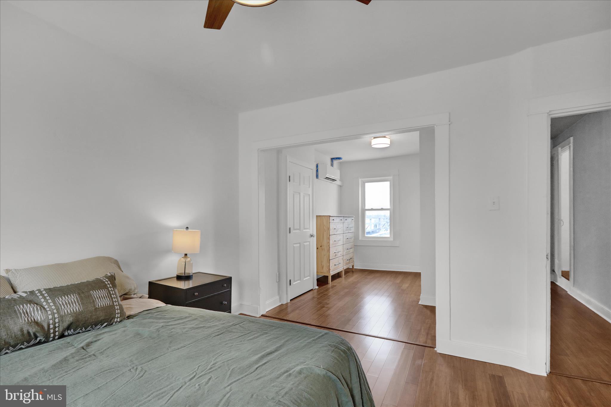 431 East Orange Street Lancaster, PA 17602 - Photo 23 of 46 a bedroom with a bed and wooden floor