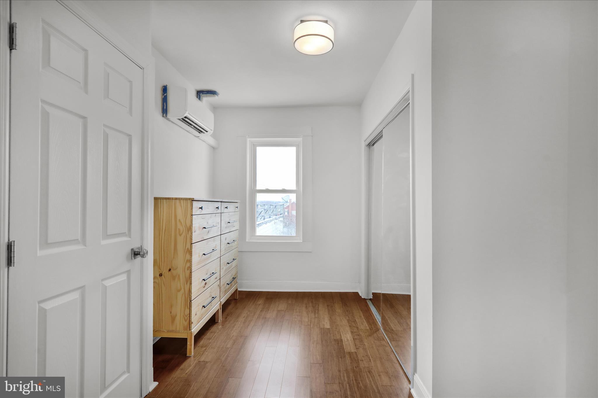 431 East Orange Street Lancaster, PA 17602 - Photo 24 of 46 wooden floor in an empty room with a window