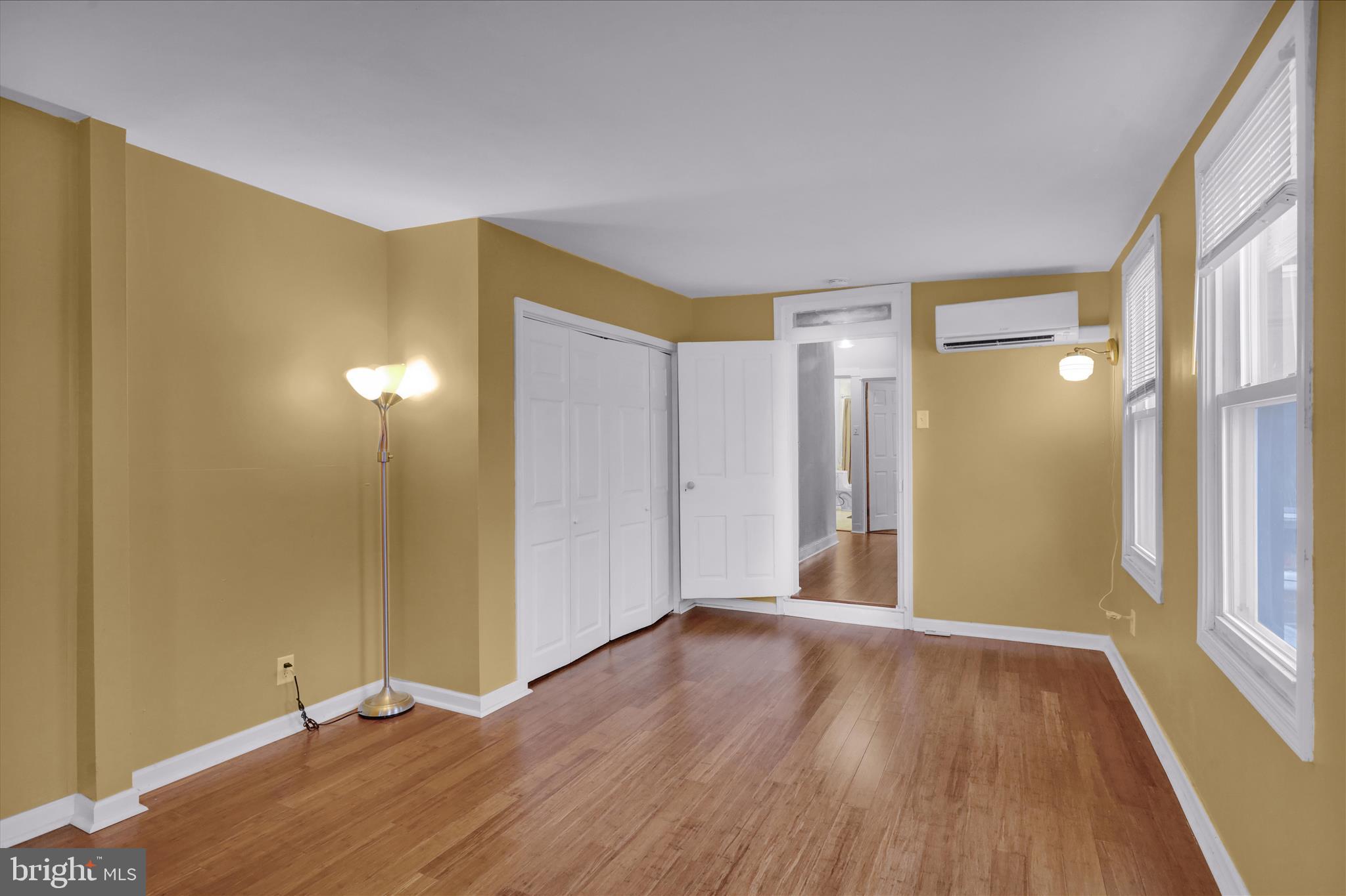 431 East Orange Street Lancaster, PA 17602 - Photo 29 of 46 a view of an empty room with wooden floor and a window