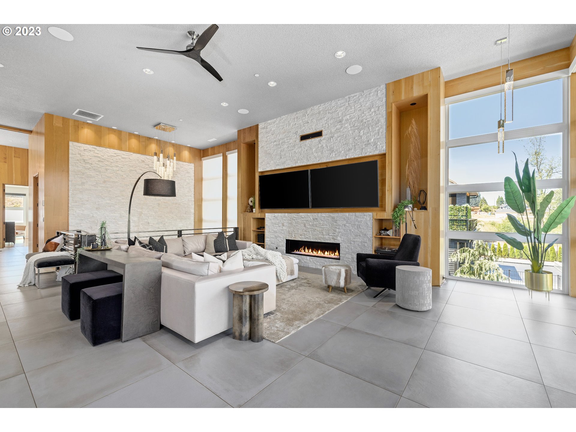 3617 Northwest McMaster Drive Camas, WA 98607 - Photo 12 of 48 a living room with stainless steel appliances kitchen island granite countertop a sink and a refrigerator