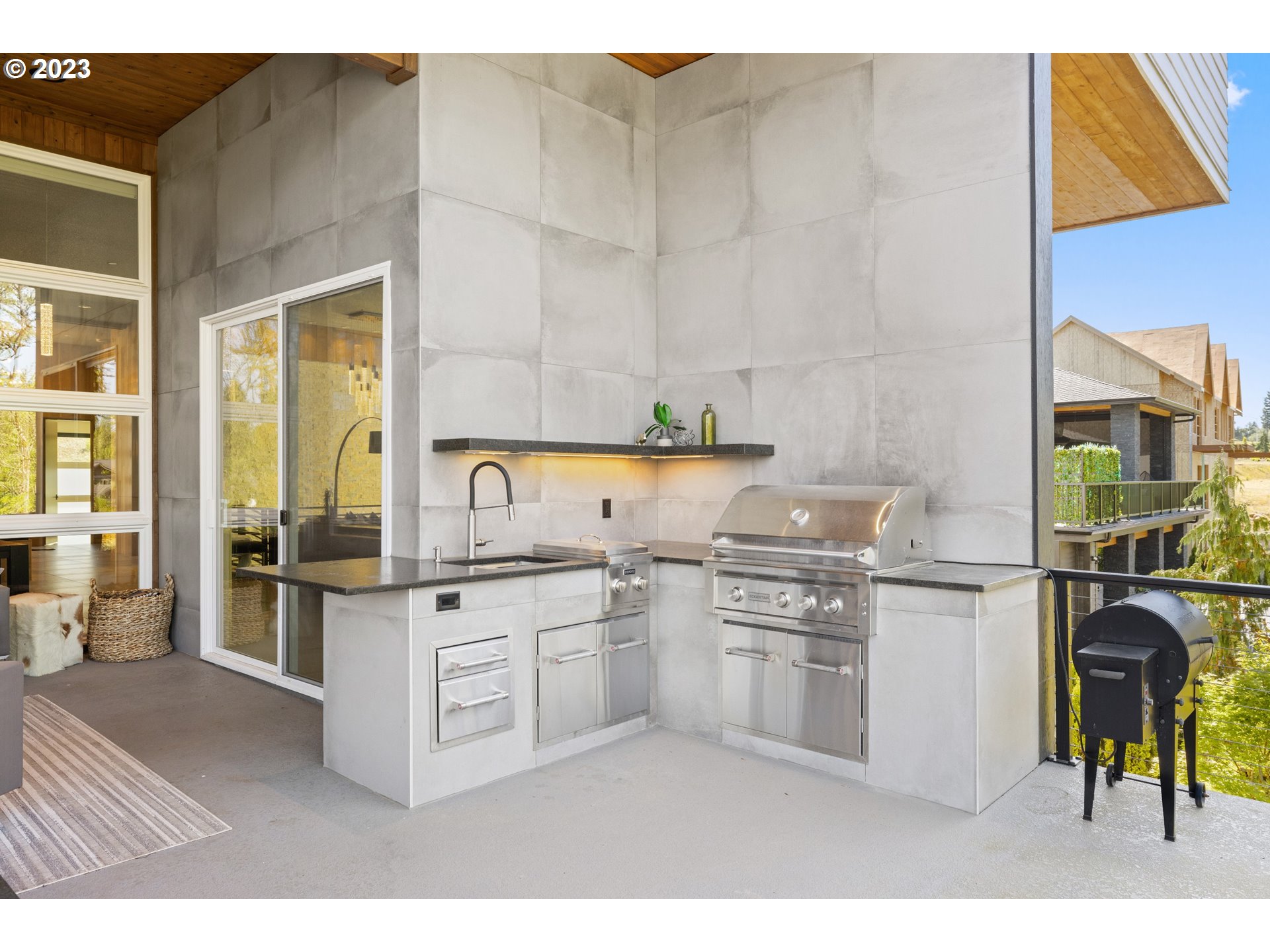 3617 Northwest McMaster Drive Camas, WA 98607 - Photo 14 of 48 a kitchen with stainless steel appliances granite countertop a stove a sink and a refrigerator