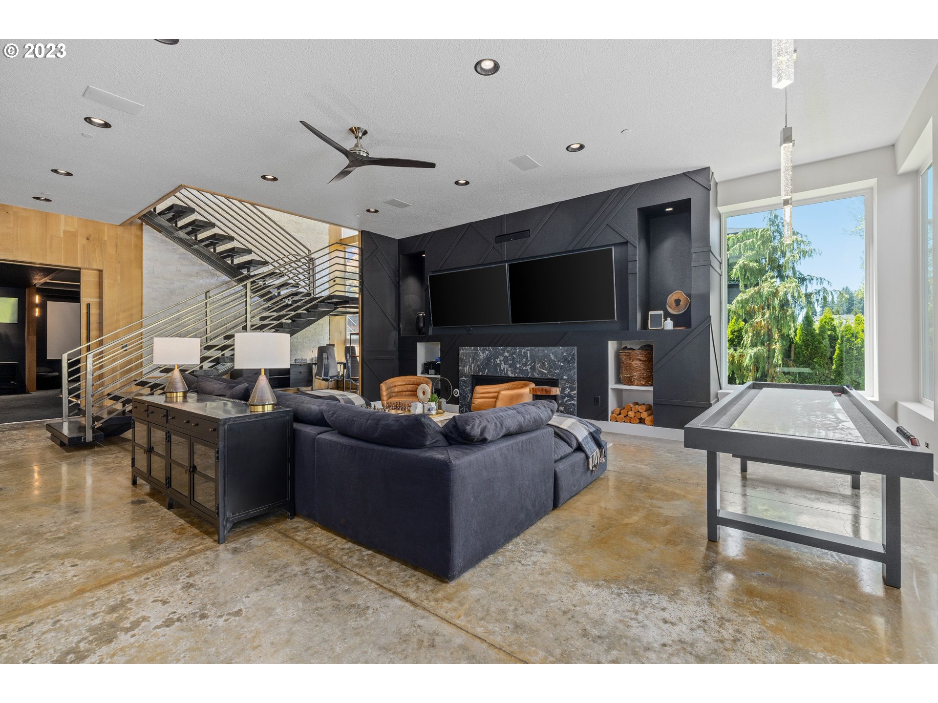 3617 Northwest McMaster Drive Camas, WA 98607 - Photo 25 of 48 a living room with furniture and a fireplace