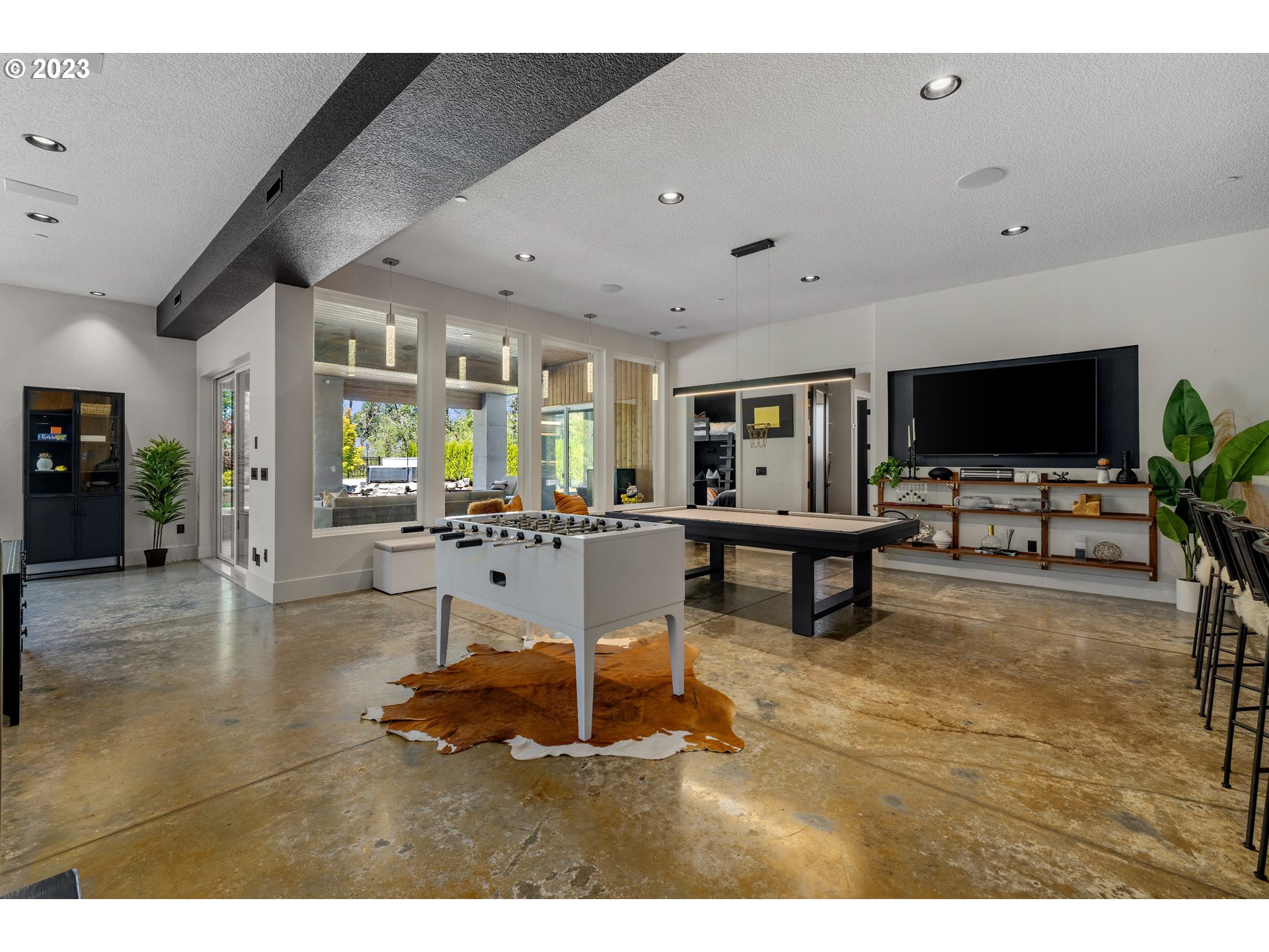 3617 Northwest McMaster Drive Camas, WA 98607 - Photo 26 of 48 a living room with furniture and a flat screen tv