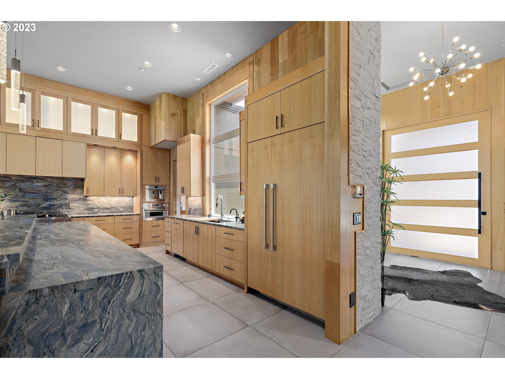 3617 Northwest McMaster Drive Camas, WA 98607 - Photo 5 of 48 a kitchen with stainless steel appliances granite countertop a refrigerator and a stove