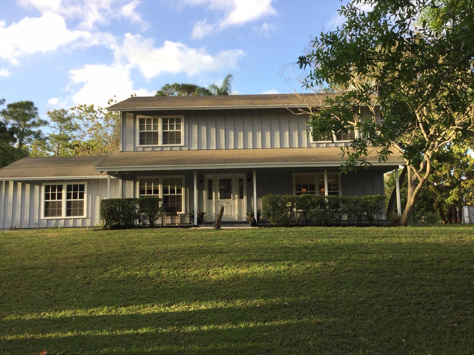 10421 Sandy Run Road Jupiter, FL 33478 - Photo 2 of 24 Front