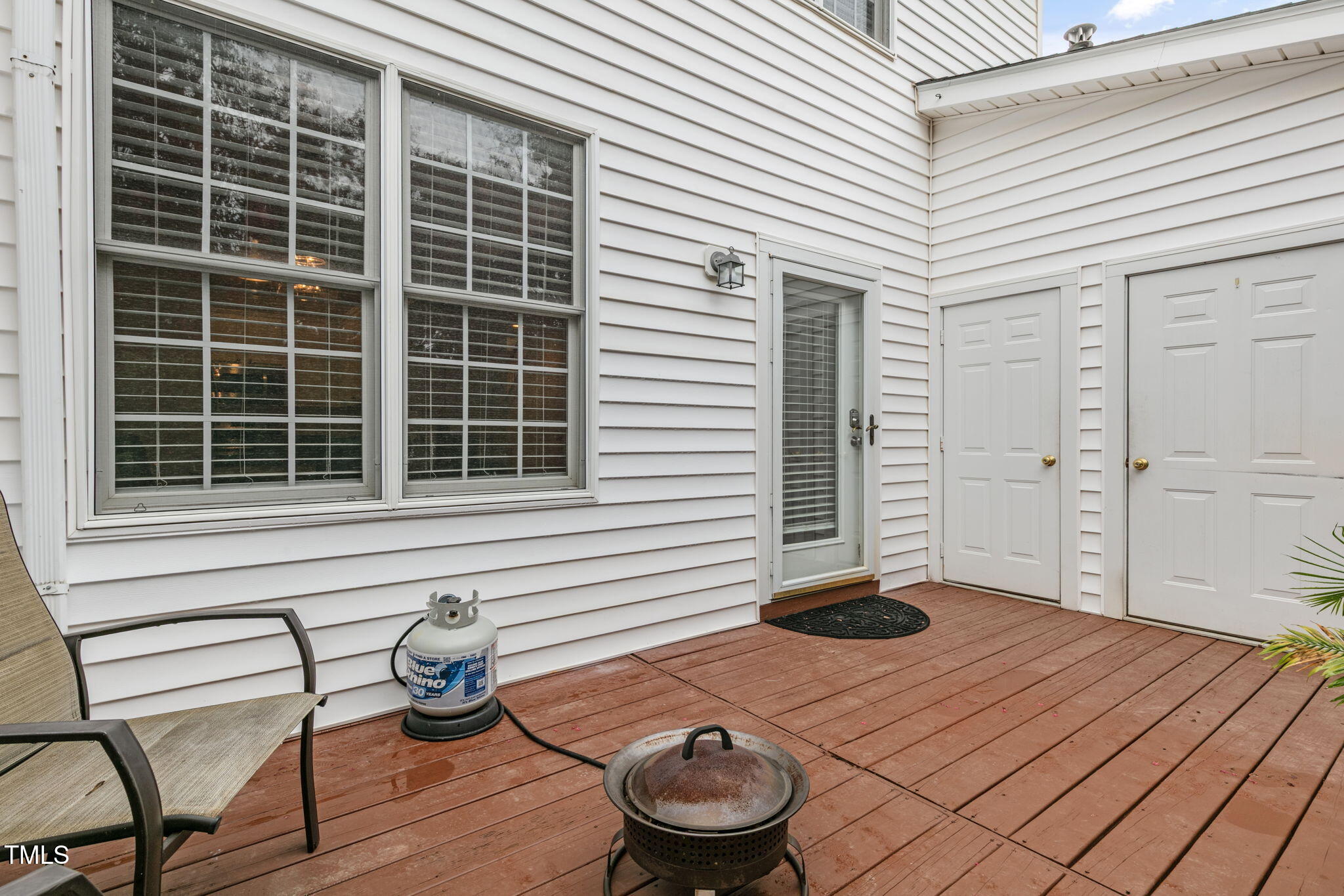 4555 Treerose Way Raleigh, NC 27606 - Photo 33 of 37 a view of a house with backyard and sitting area
