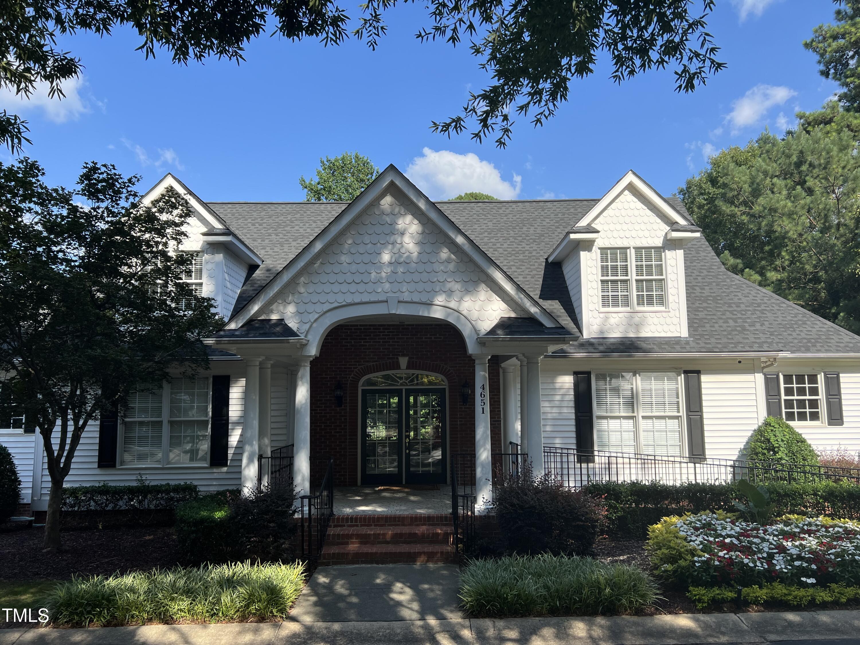 4555 Treerose Way Raleigh, NC 27606 - Photo 34 of 37 a front view of a house with a garden