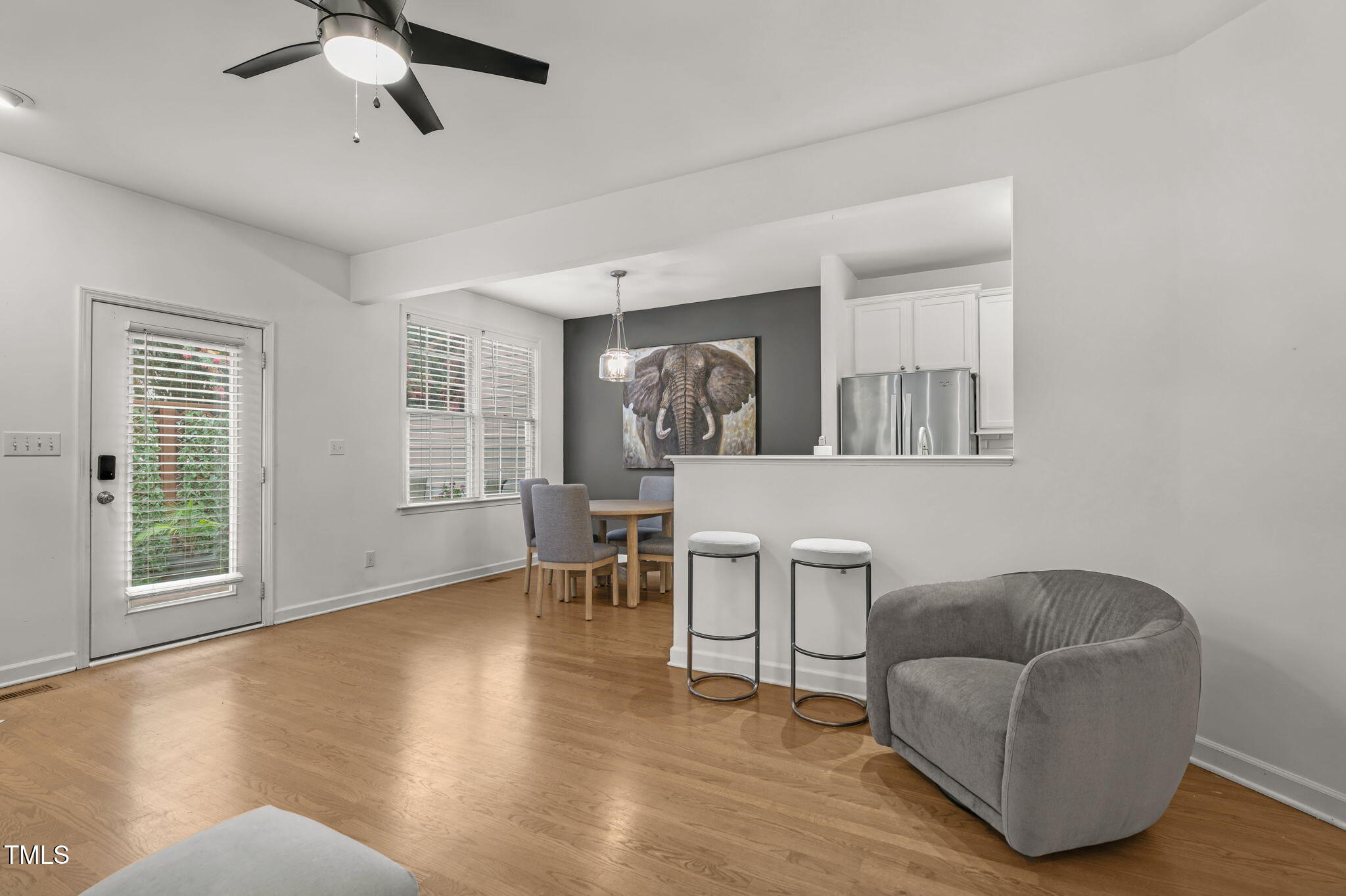 4555 Treerose Way Raleigh, NC 27606 - Photo 4 of 37 a living room with furniture and a window