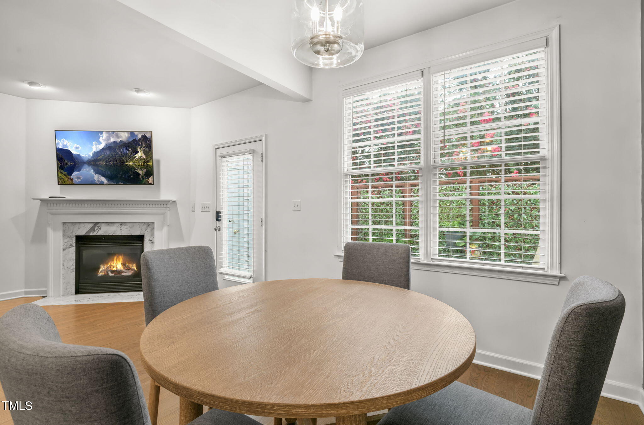 4555 Treerose Way Raleigh, NC 27606 - Photo 5 of 37 a living room with furniture and a fireplace