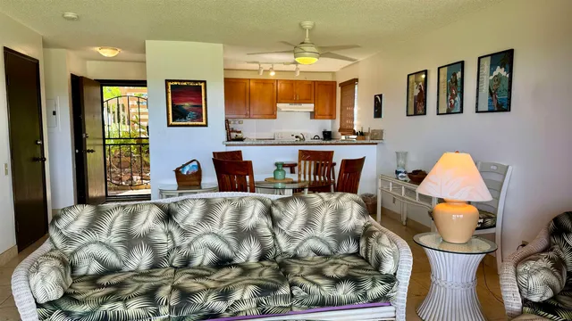 a view of a living room and dining room