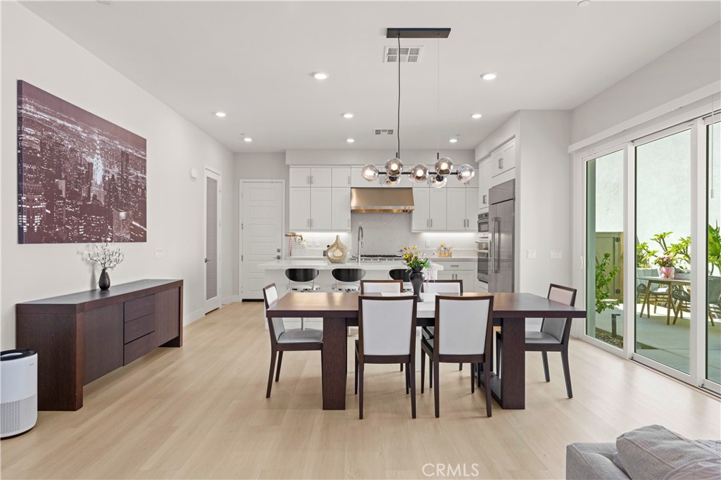 259 Chorus Irvine, CA 92618 - Photo 13 of 56 a view of a dining room with furniture window and outside view