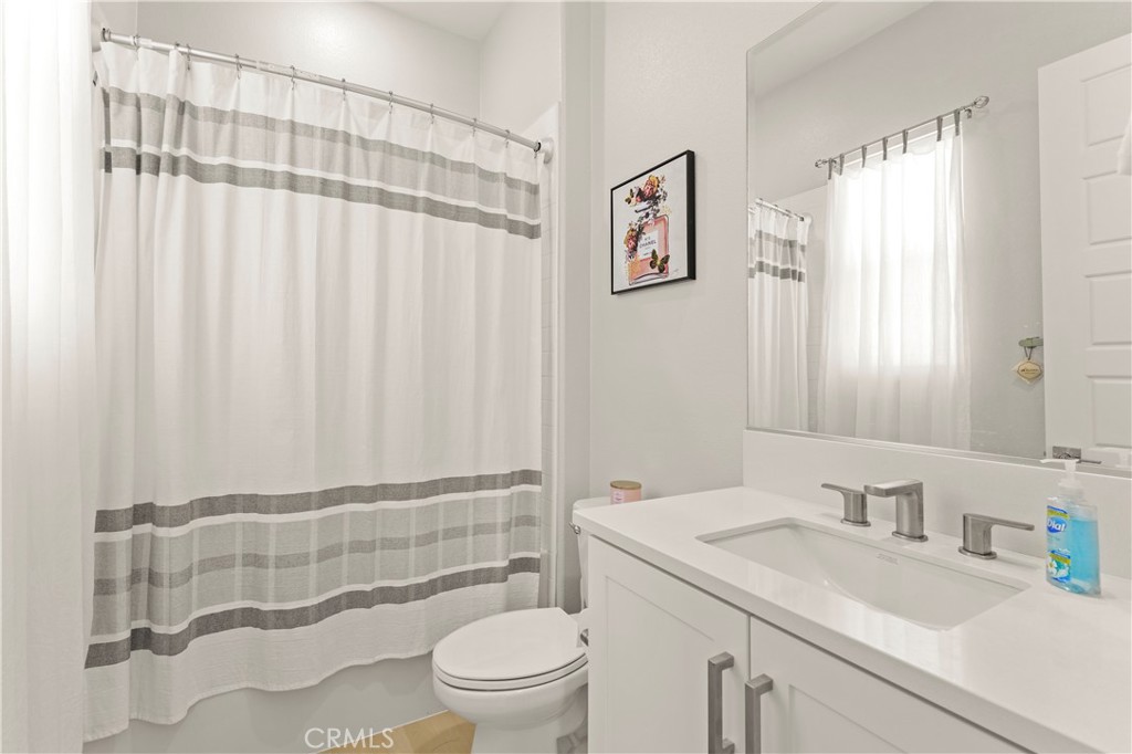 259 Chorus Irvine, CA 92618 - Photo 20 of 56 a bathroom with a sink a toilet and shower