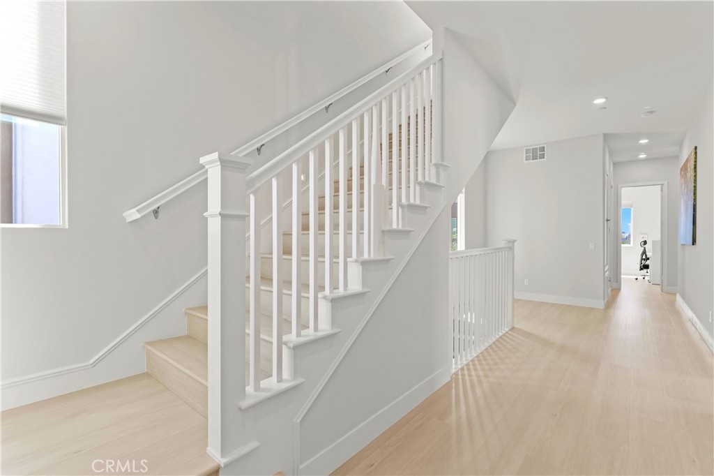 259 Chorus Irvine, CA 92618 - Photo 41 of 56 a view of staircase with white walls and a window