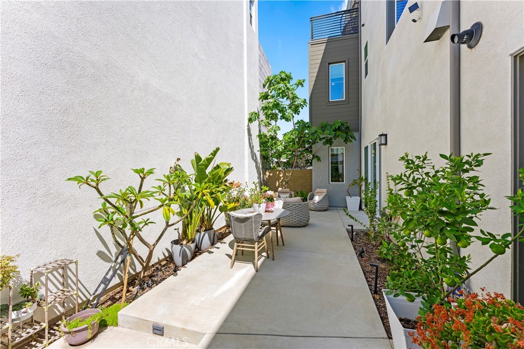 259 Chorus Irvine, CA 92618 - Photo 44 of 56 a view of a backyard with potted plants