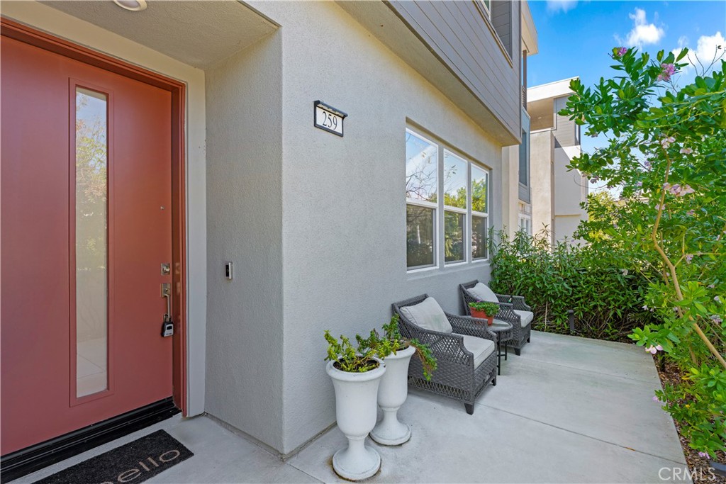 259 Chorus Irvine, CA 92618 - Photo 45 of 56 a view of a porch with chairs and a potted plant
