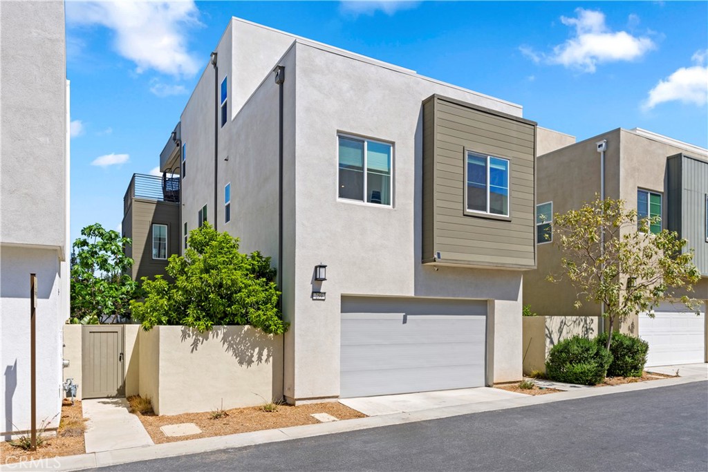 259 Chorus Irvine, CA 92618 - Photo 49 of 56 a front view of a house with a yard