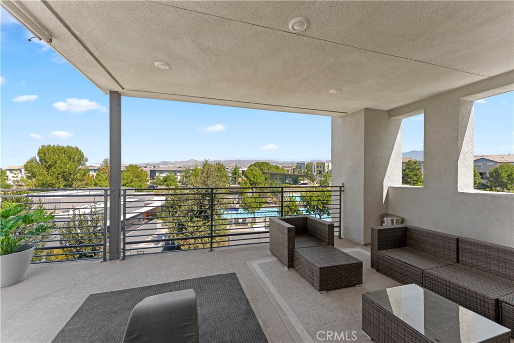 259 Chorus Irvine, CA 92618 - Photo 5 of 56 a balcony with furniture and city view