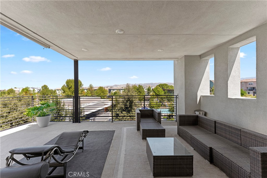 259 Chorus Irvine, CA 92618 - Photo 6 of 56 a living room with furniture and a view of balcony
