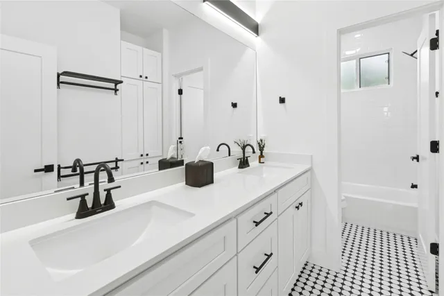 a bathroom with a sink and a tub