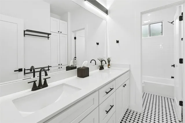 a bathroom with a sink and a tub