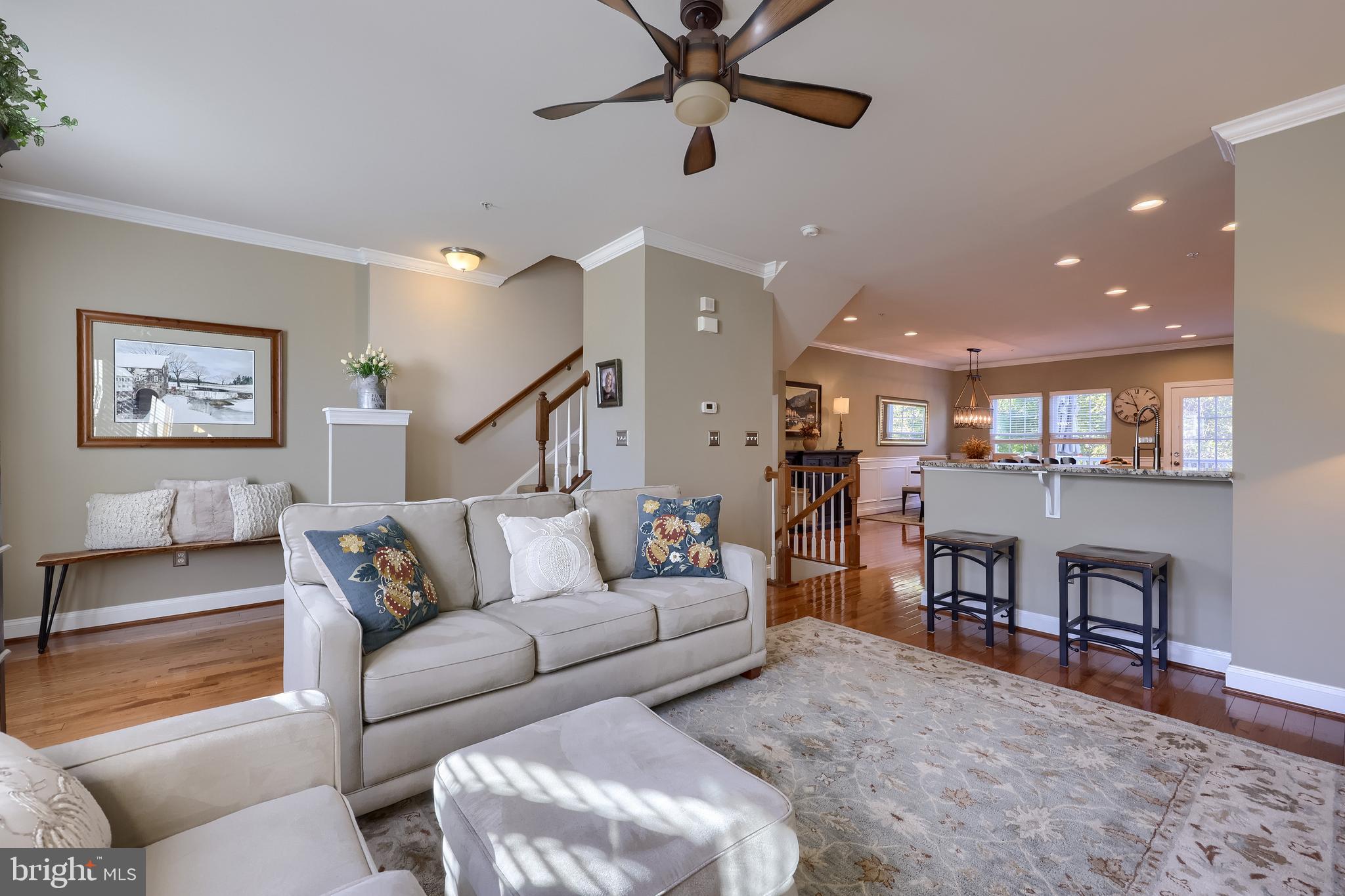 938 Stonehaven Way York, PA 17403 - Photo 16 of 45 a living room with furniture and a wooden floor