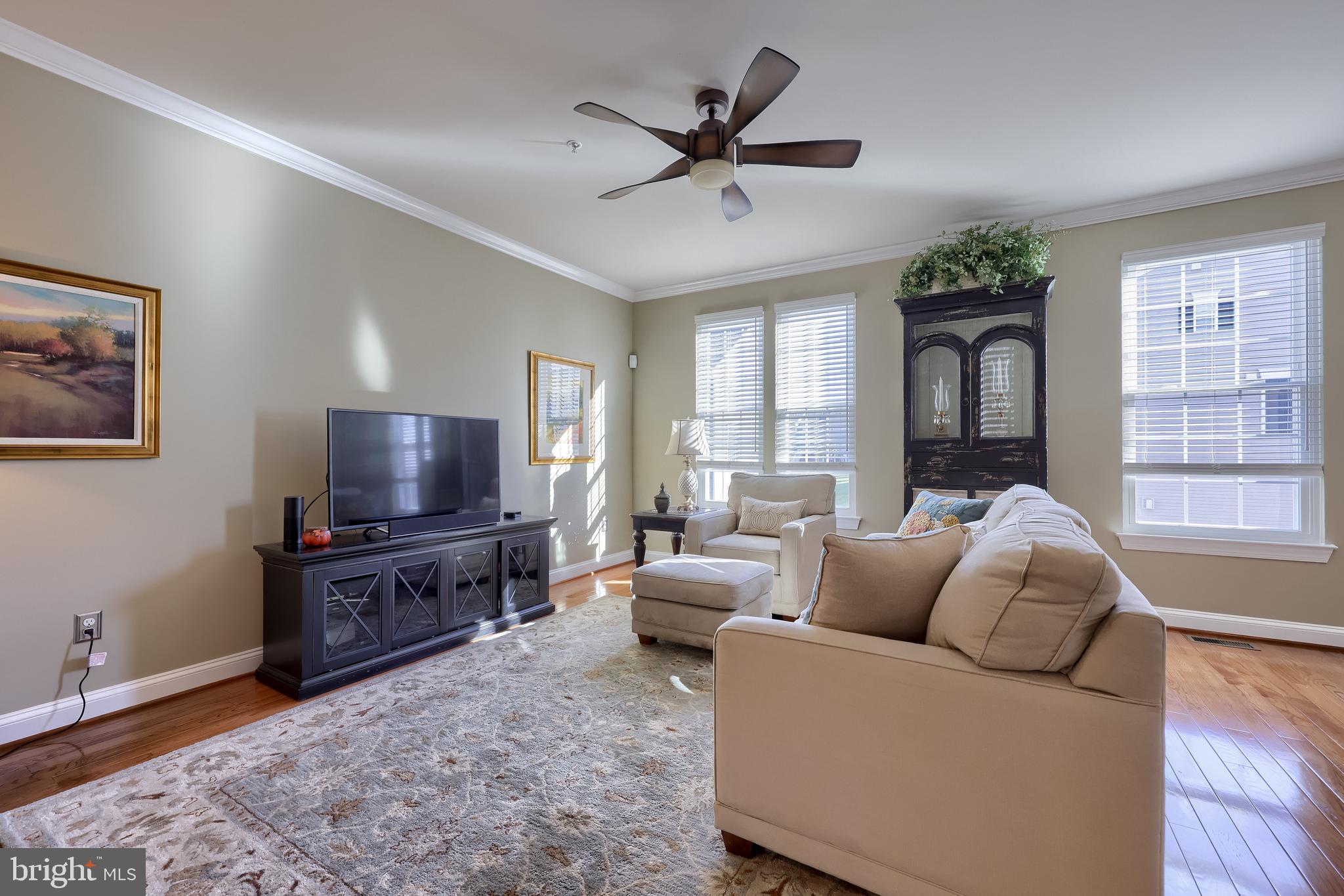 938 Stonehaven Way York, PA 17403 - Photo 17 of 45 a living room with furniture and a flat screen tv