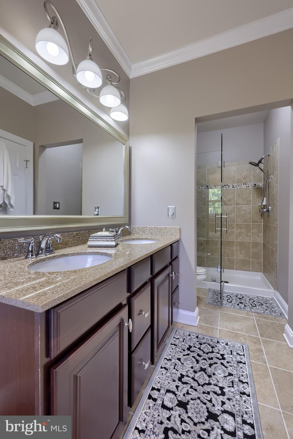 938 Stonehaven Way York, PA 17403 - Photo 24 of 45 a bathroom with a sink a vanity and a mirror