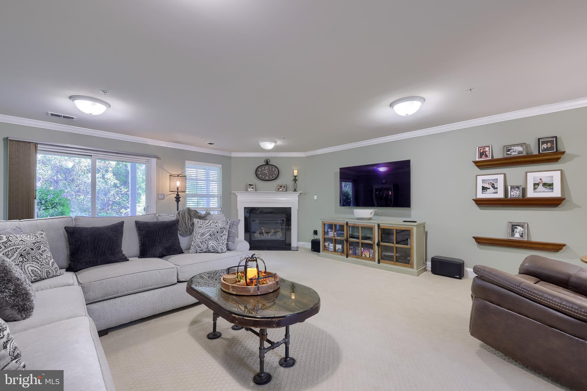 938 Stonehaven Way York, PA 17403 - Photo 31 of 45 a living room with furniture and a flat screen tv