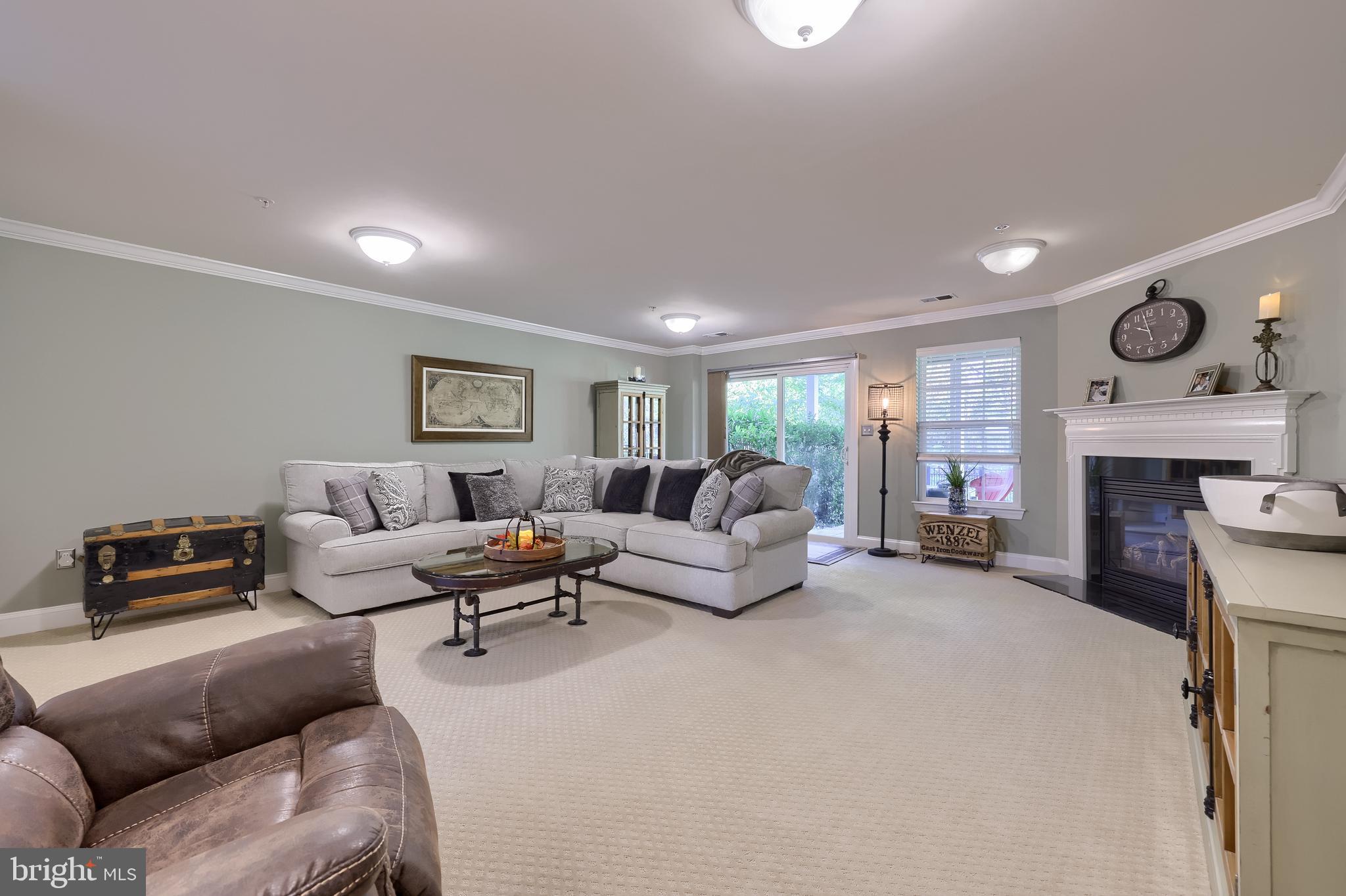 938 Stonehaven Way York, PA 17403 - Photo 32 of 45 a living room with furniture and a fireplace