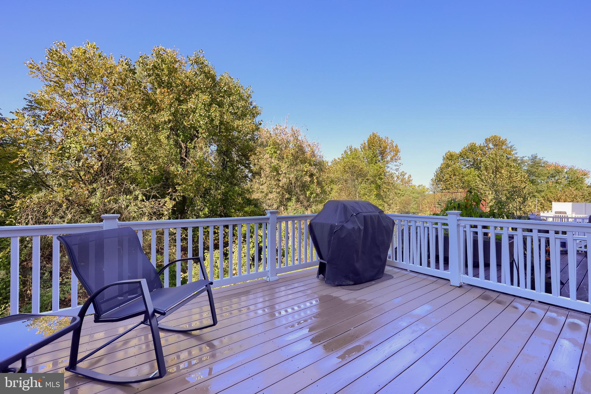 938 Stonehaven Way York, PA 17403 - Photo 36 of 45 a view of balcony with wooden floor and outdoor seating