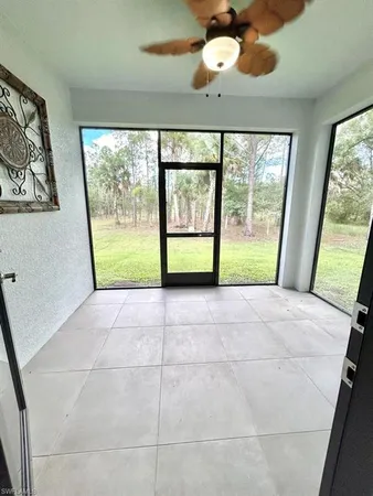 a kitchen with a stove a sink and a refrigerator