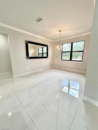 a view of livingroom with furniture and window